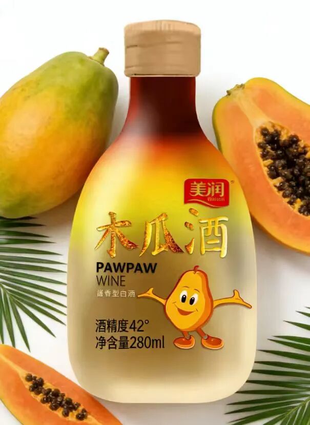 Close-up photo of the papaya and the bottle